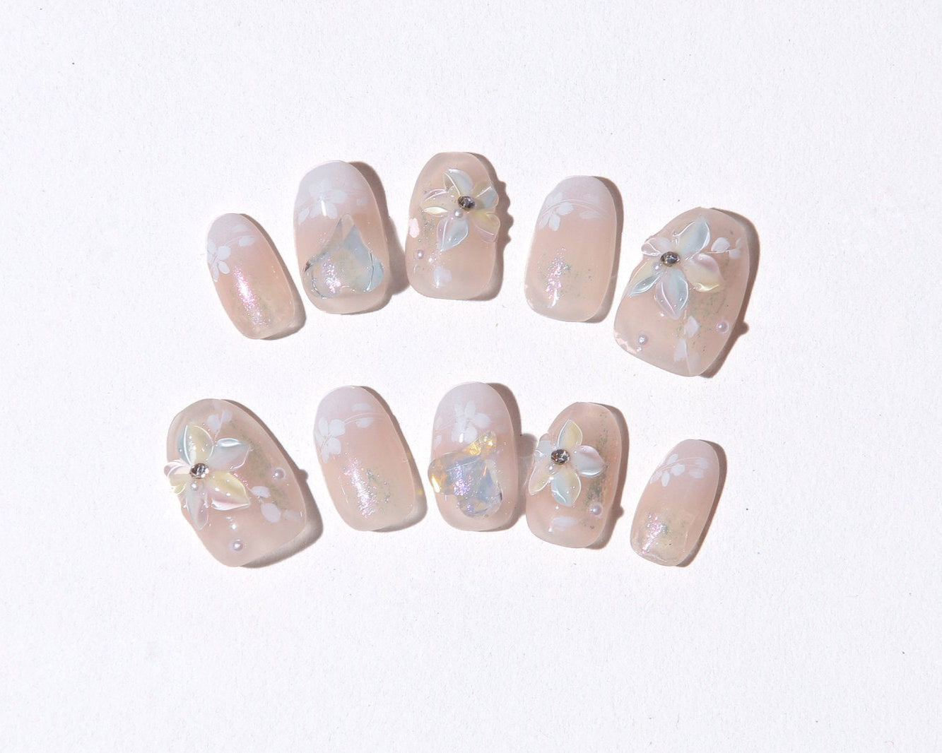 ootd.nail クリアフラワー × オーロラニュアンス ジェルネイルチップ｜立体フラワーパーツとオーロラホイルを組み合わせた透明感あふれるデザイン。繰り返し使えるリユーザブルネイル。