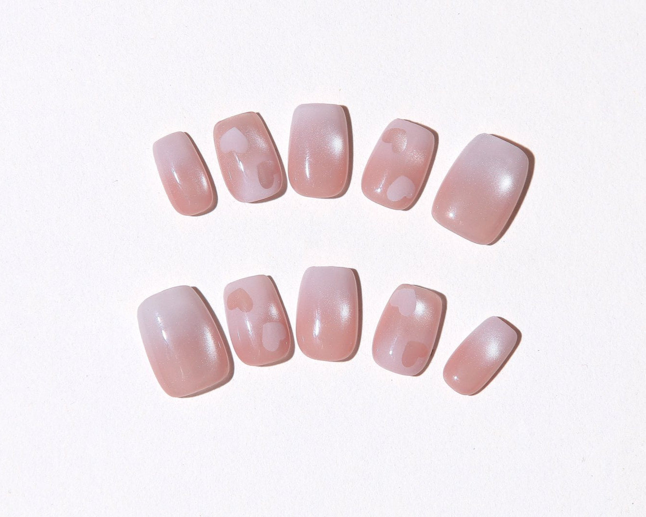 ootd.nail ハートピンク ジェルネイルチップ｜くすみピンクに透け感のあるハートを描いた大人かわいいデザイン。優しくフェミニンな印象を与えるリユーザブルネイル。